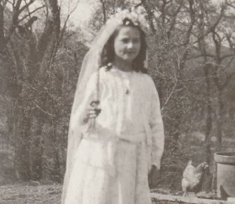 Photo of Annella in her First Communion dress.